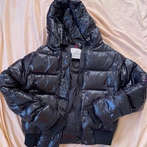 This is a Moncler jacket. It’s a size 2.